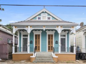 blue vinyl siding looks great on an eclectic one-story ranch style house